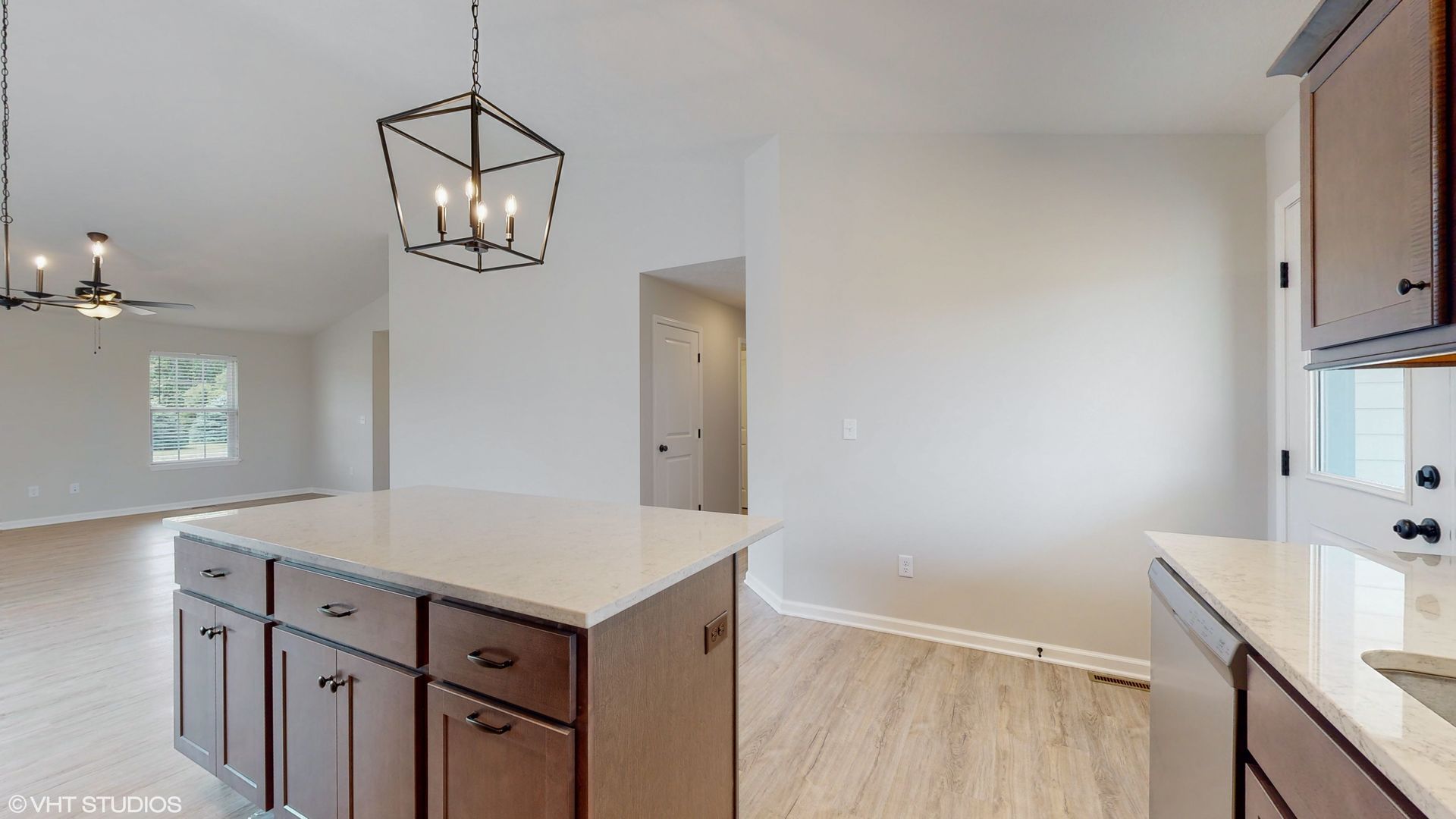 There is a large island in the middle of the kitchen.