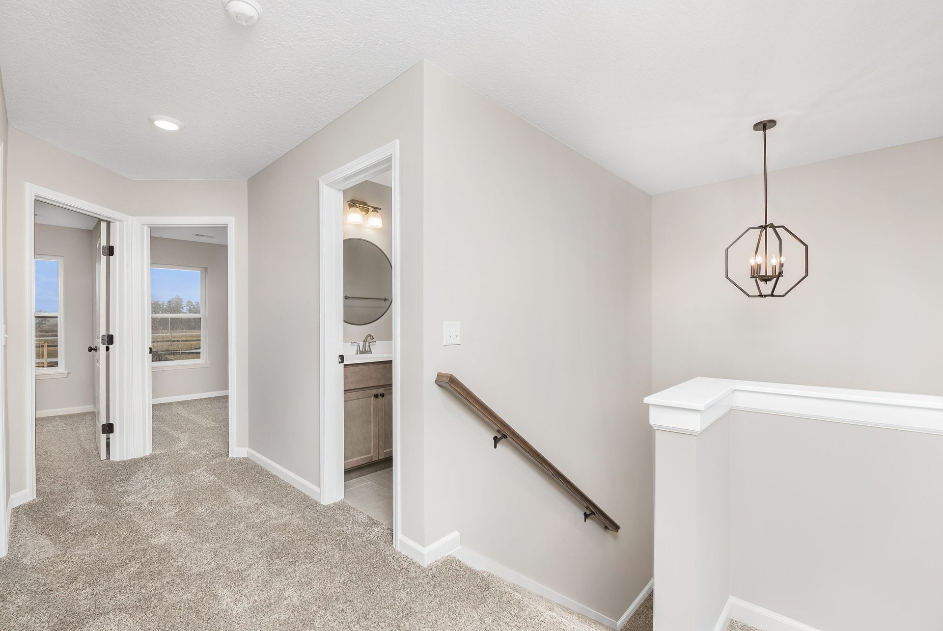 There is a staircase leading up to the second floor of a house.