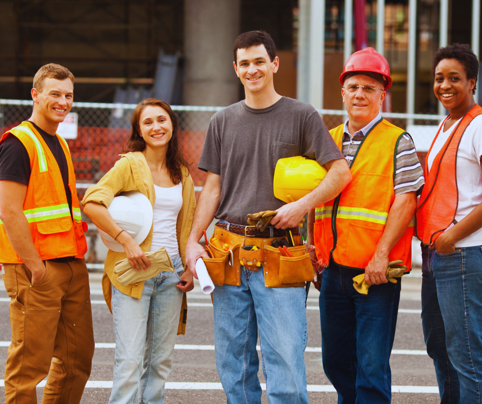 Construction team collaborating on-site with remote virtual assistant handling project coordination 