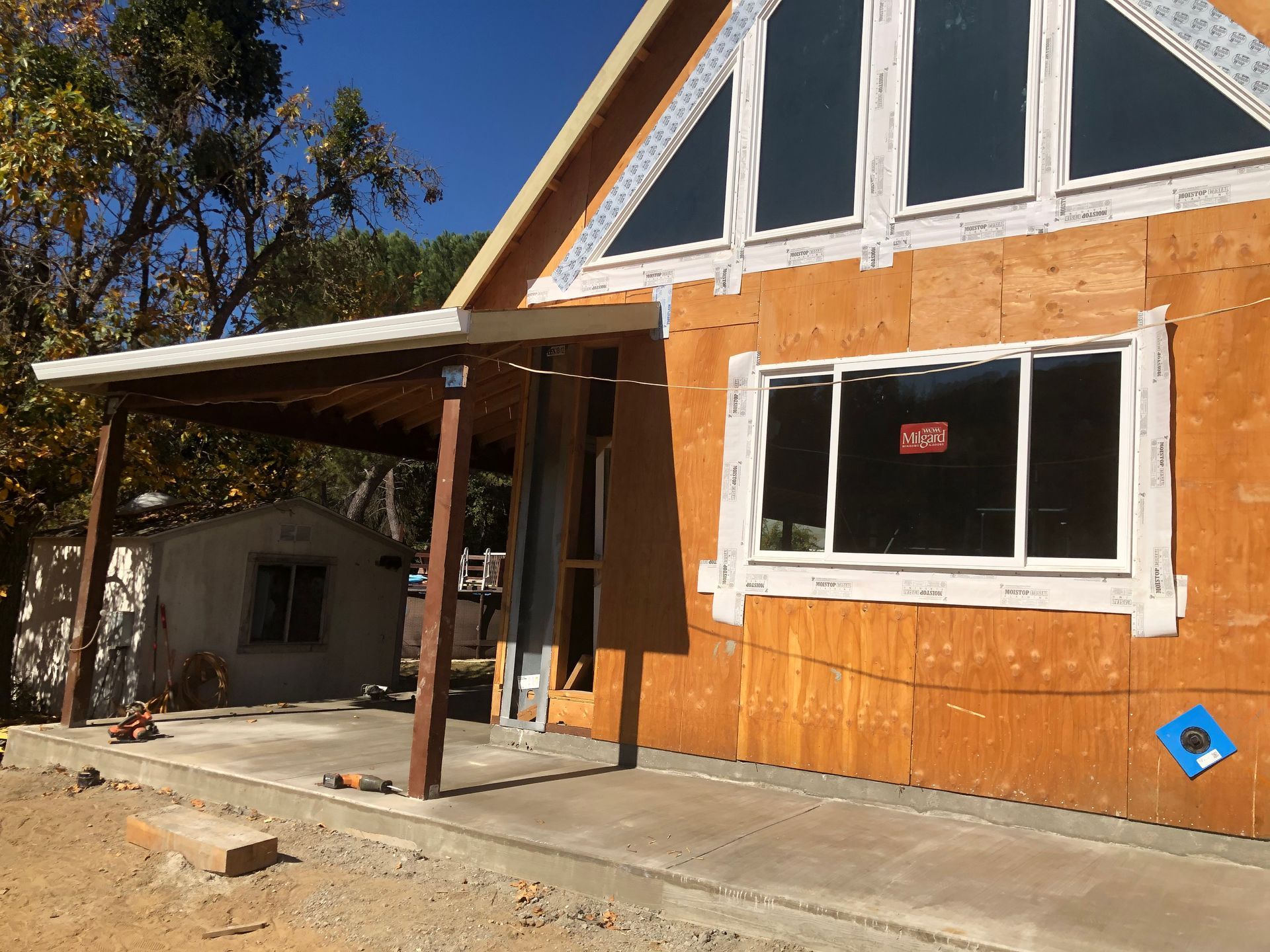 A white door with a silver handle and a keyhole.