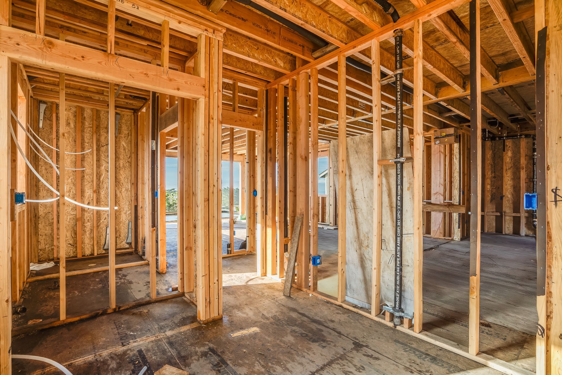 Interior wooden framing of a house under construction.