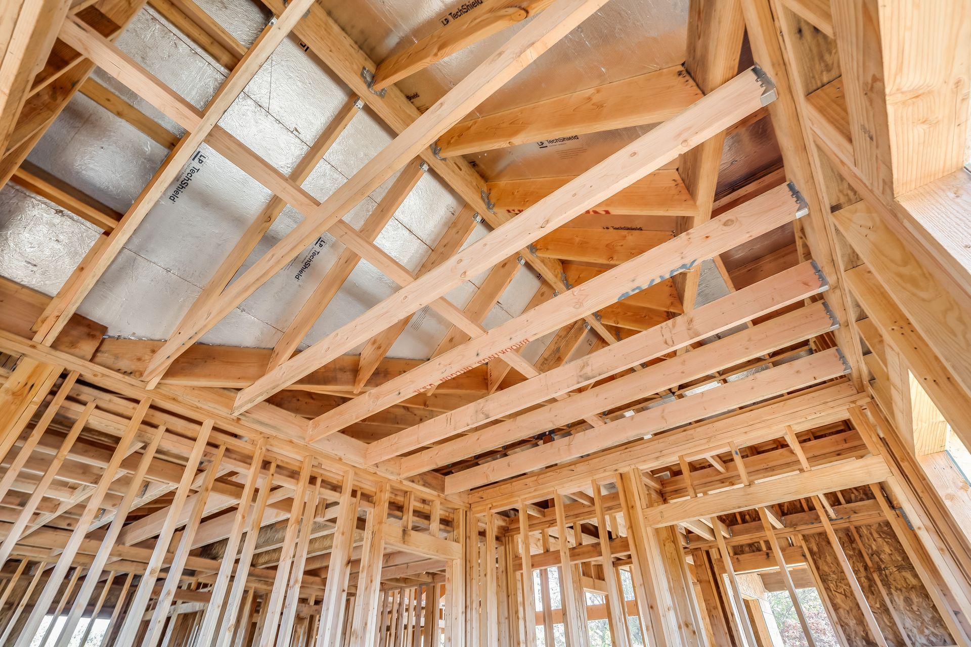 Wooden framework of a house under construction.