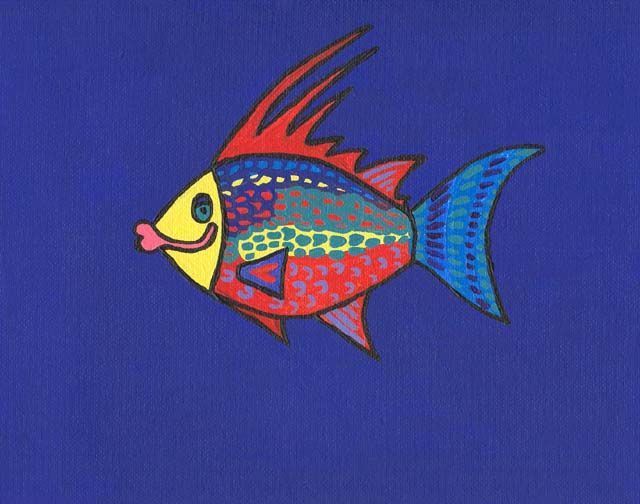 Colorful fish with red fins and yellow face swimming in a blue background.