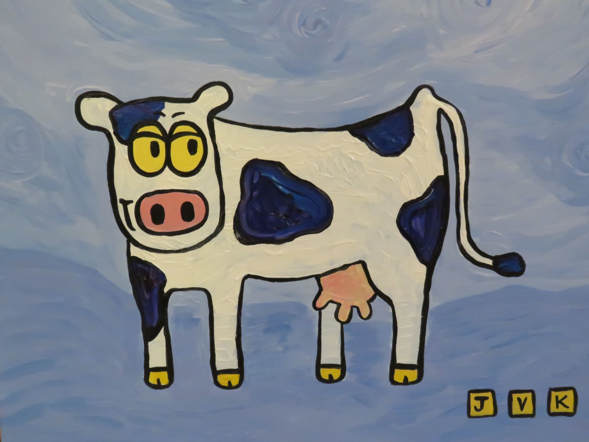 Cartoon cow with white body and blue spots, a pink nose, and yellow eyes. Set against a blue background.