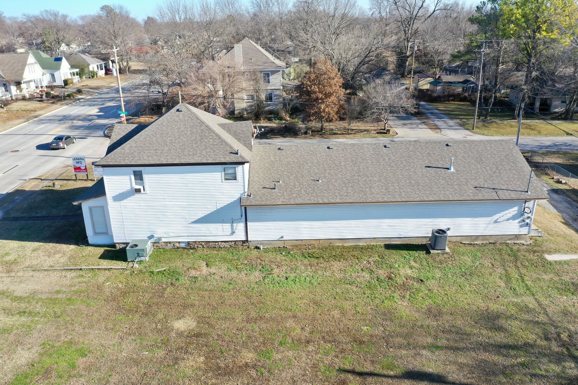 an aerial view of a house in a residential area .