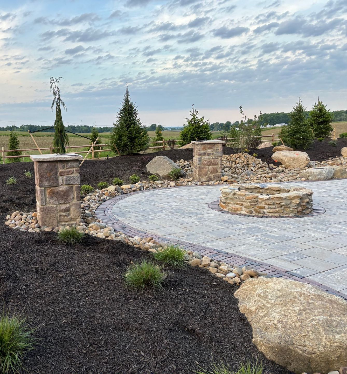 A close up of a stone wall made of different types of rocks.
