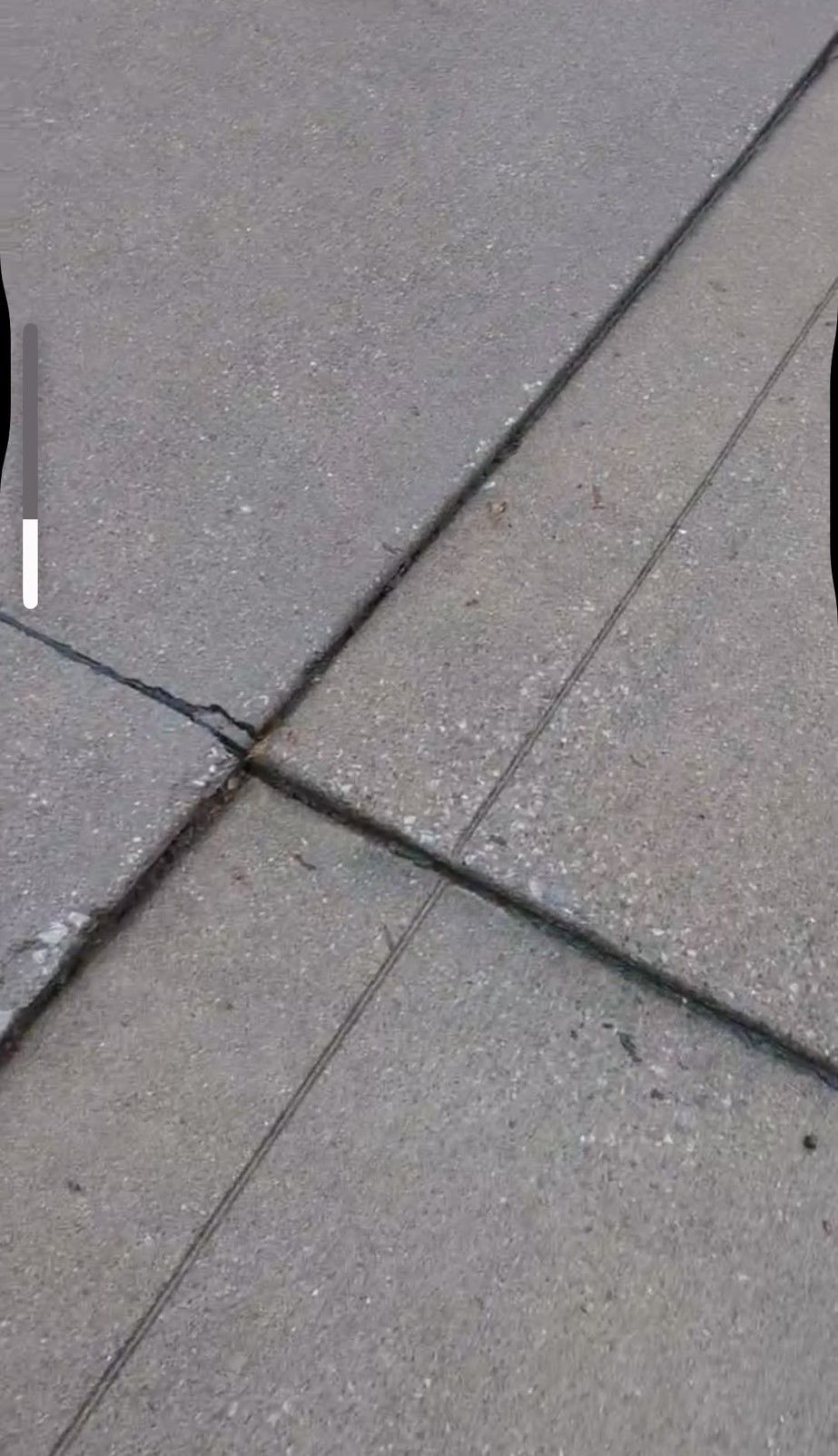 A photo of a concrete sidewalk.