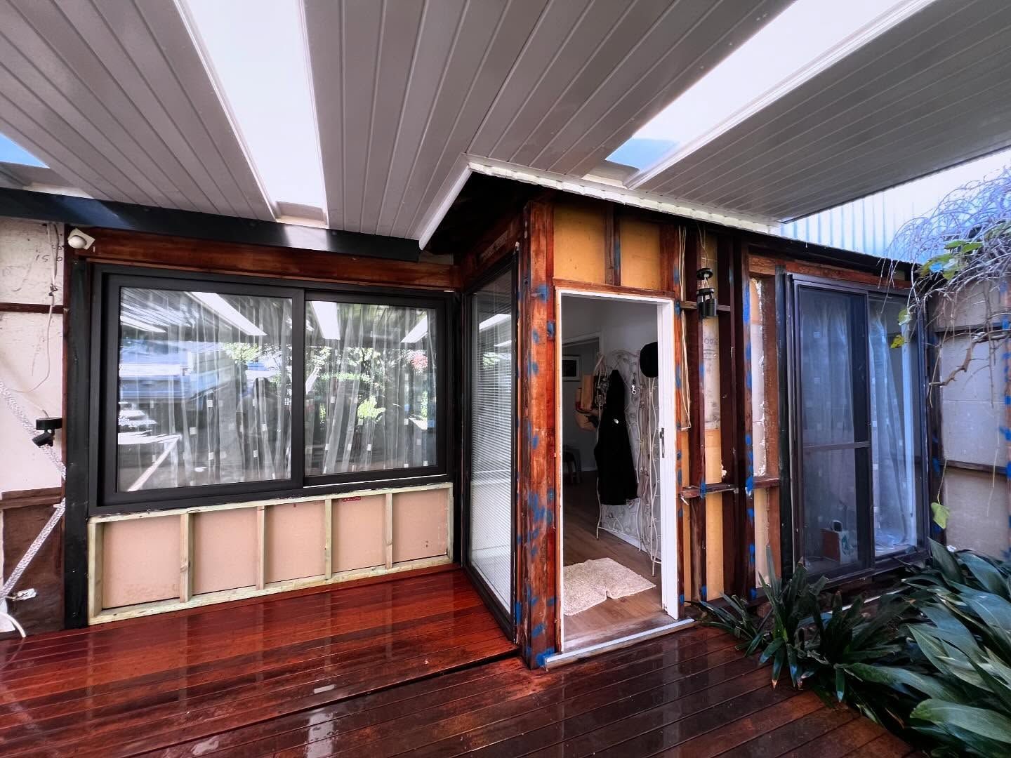 Exterior of a Building With Exposed Wood Framing — Ecowave Solutions In Newcastle, NSW