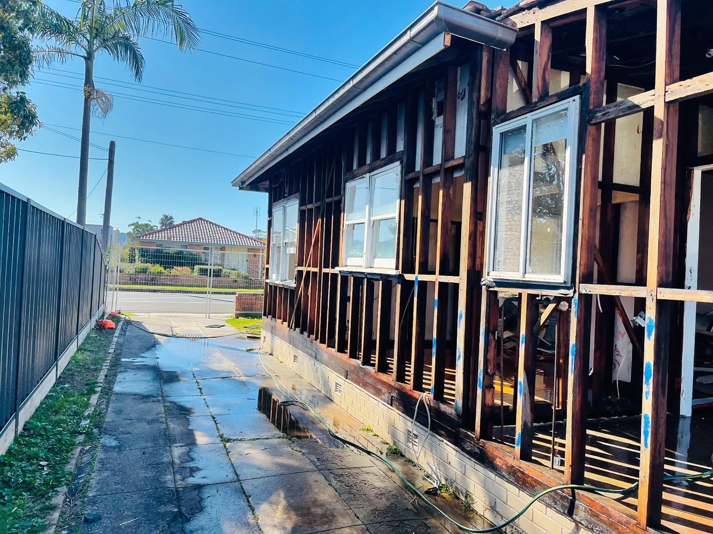 House Exterior Under Renovation; Wood Frame Visible — Ecowave Solutions In Gosford, NSW