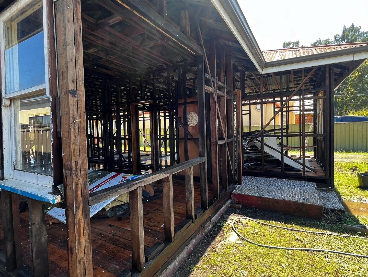 Exterior View of a Partially Burned Wooden House — Ecowave Solutions In Gosford, NSW