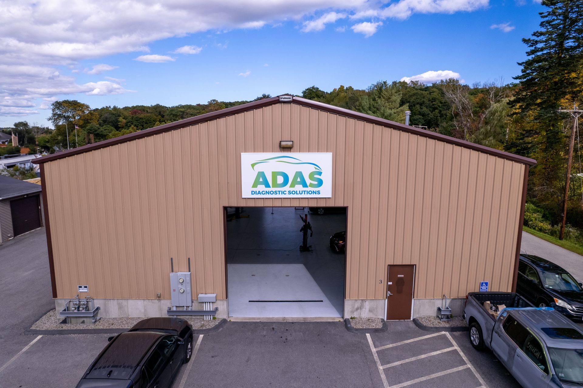 A computer generated image of a car driving down a road