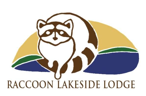 Raccoon logo with “Raccoon Lakeside Lodge” text over green, gold, and blue waves