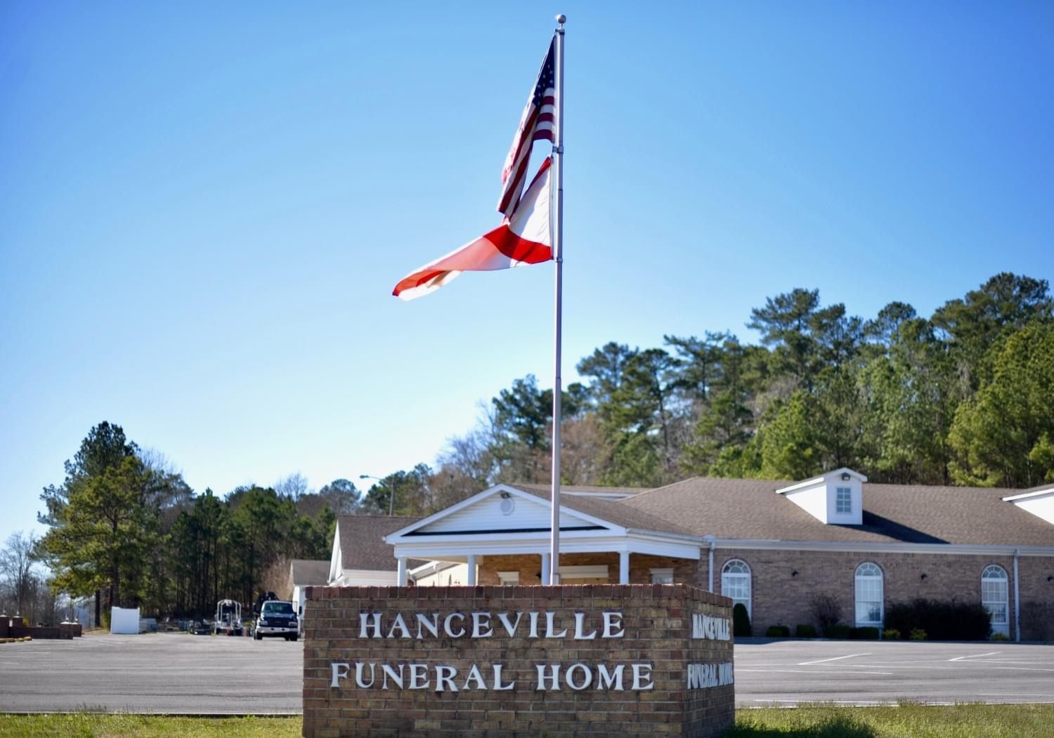 A church with a cross on the front of it
