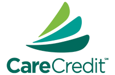 The logo for carecredit is a green sailboat.