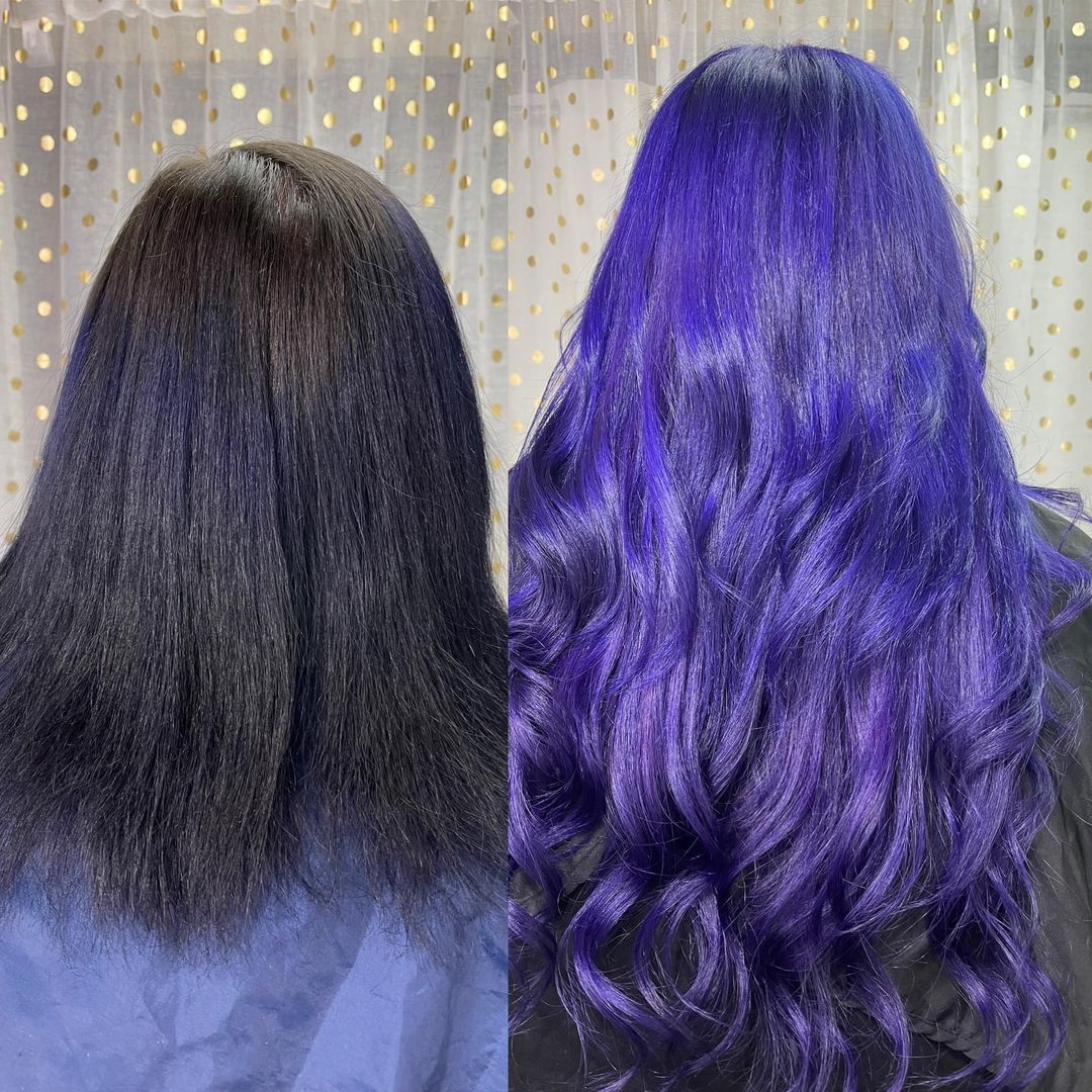A woman with black hair and a woman with purple hair.