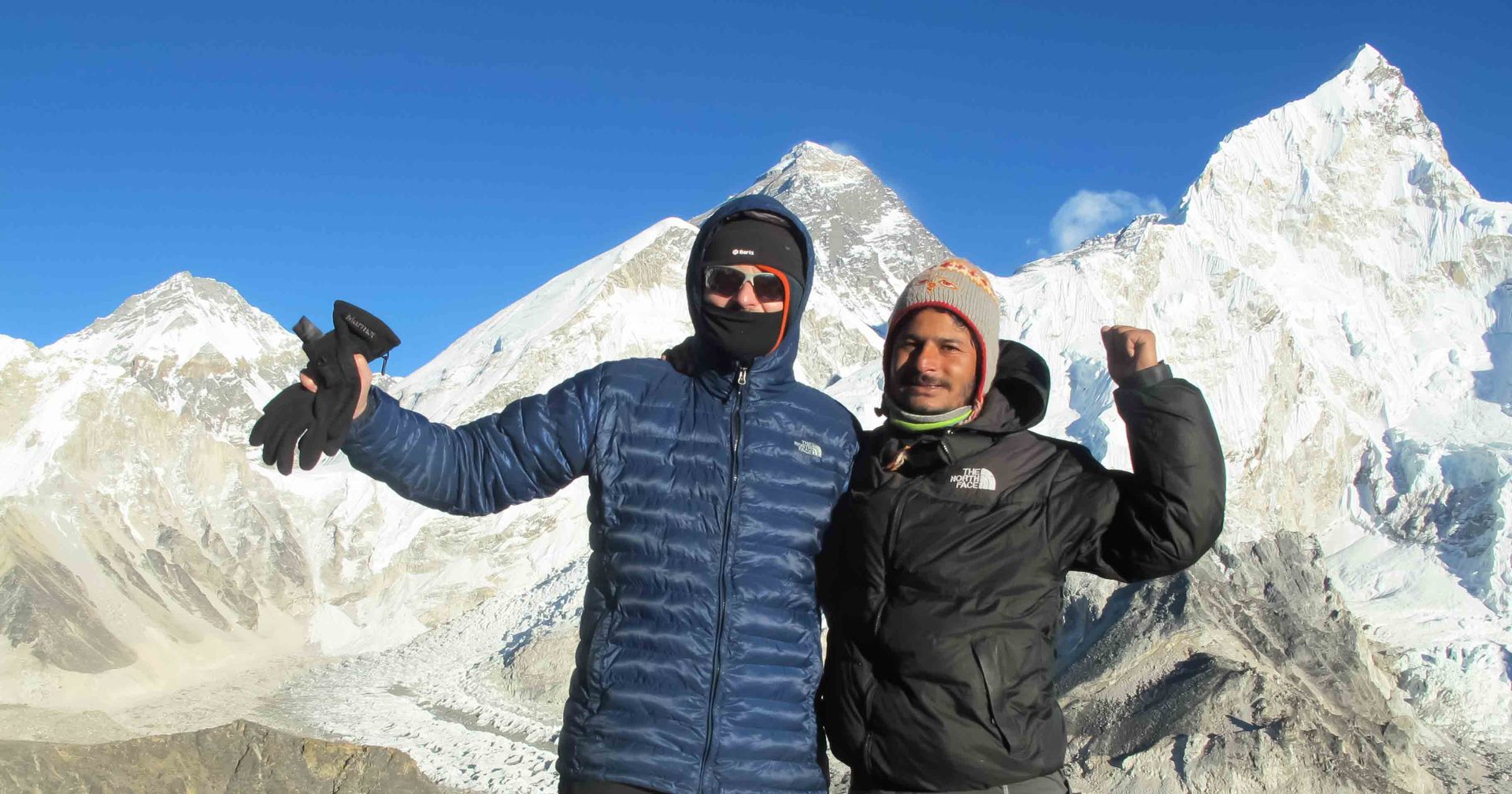 trekker with guide on trek in nepal