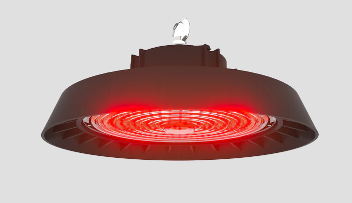A ceiling light with a red light coming out of it.