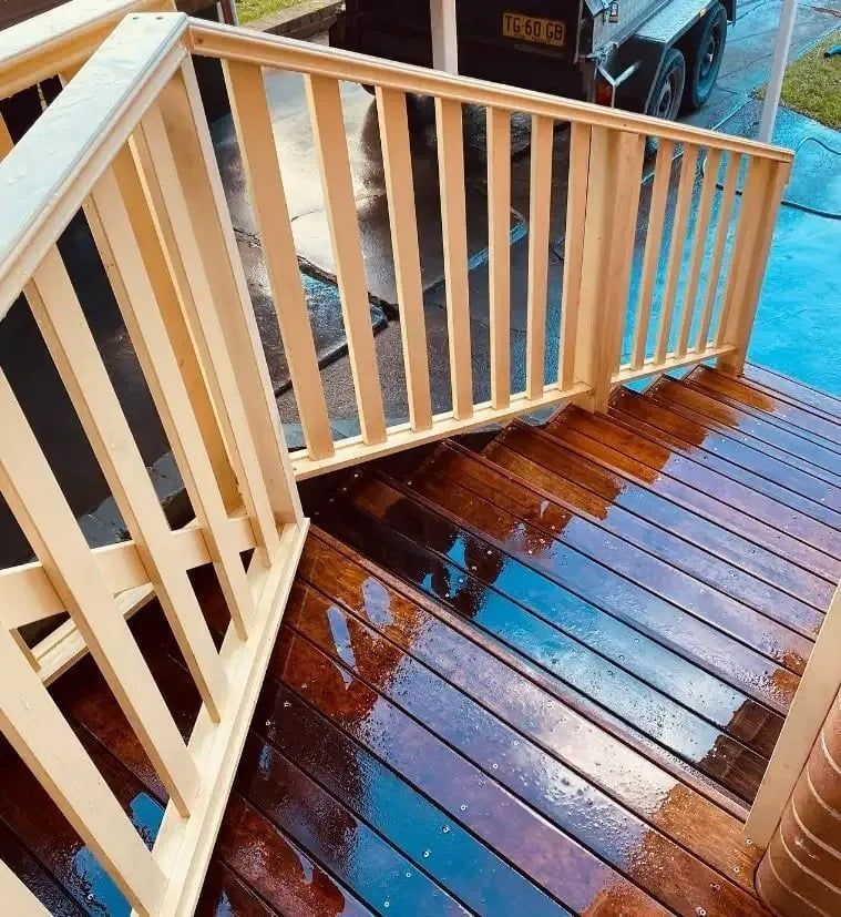 Wooden Deck Stairs With a Light-colored Railing — Kalora Carpentry & Restorations in Charlestown, NSW
