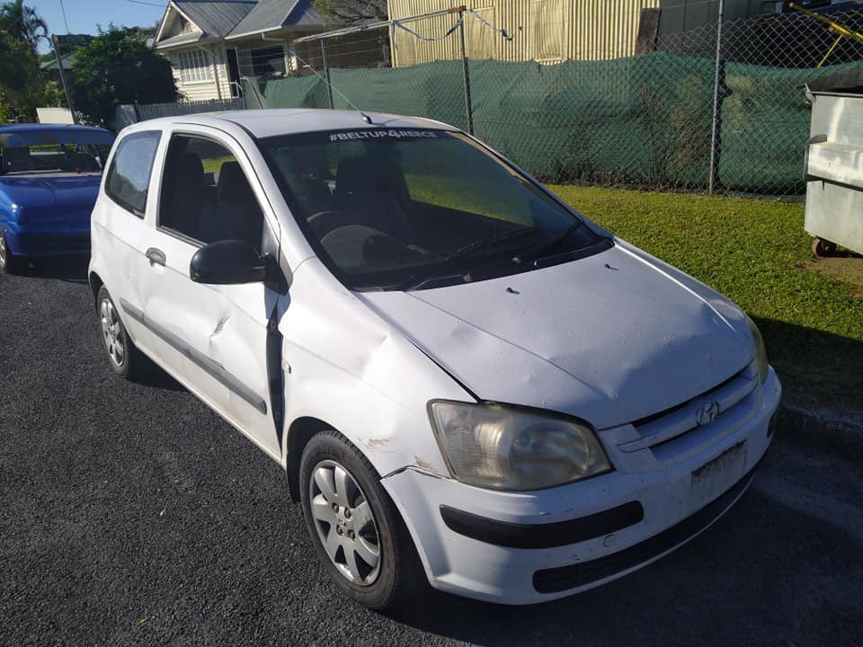 White Car With Damage On The Passenger Side — Crossway Wreckers & Mechanical In Gordonvale, QLD