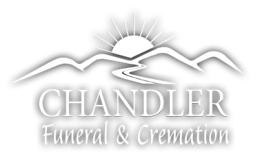 Chandler logo featuring a golden sun rising over mountains, and a river below.