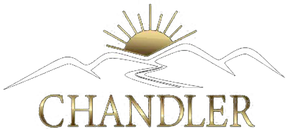 Chandler logo featuring a golden sun rising over mountains, and a river below.