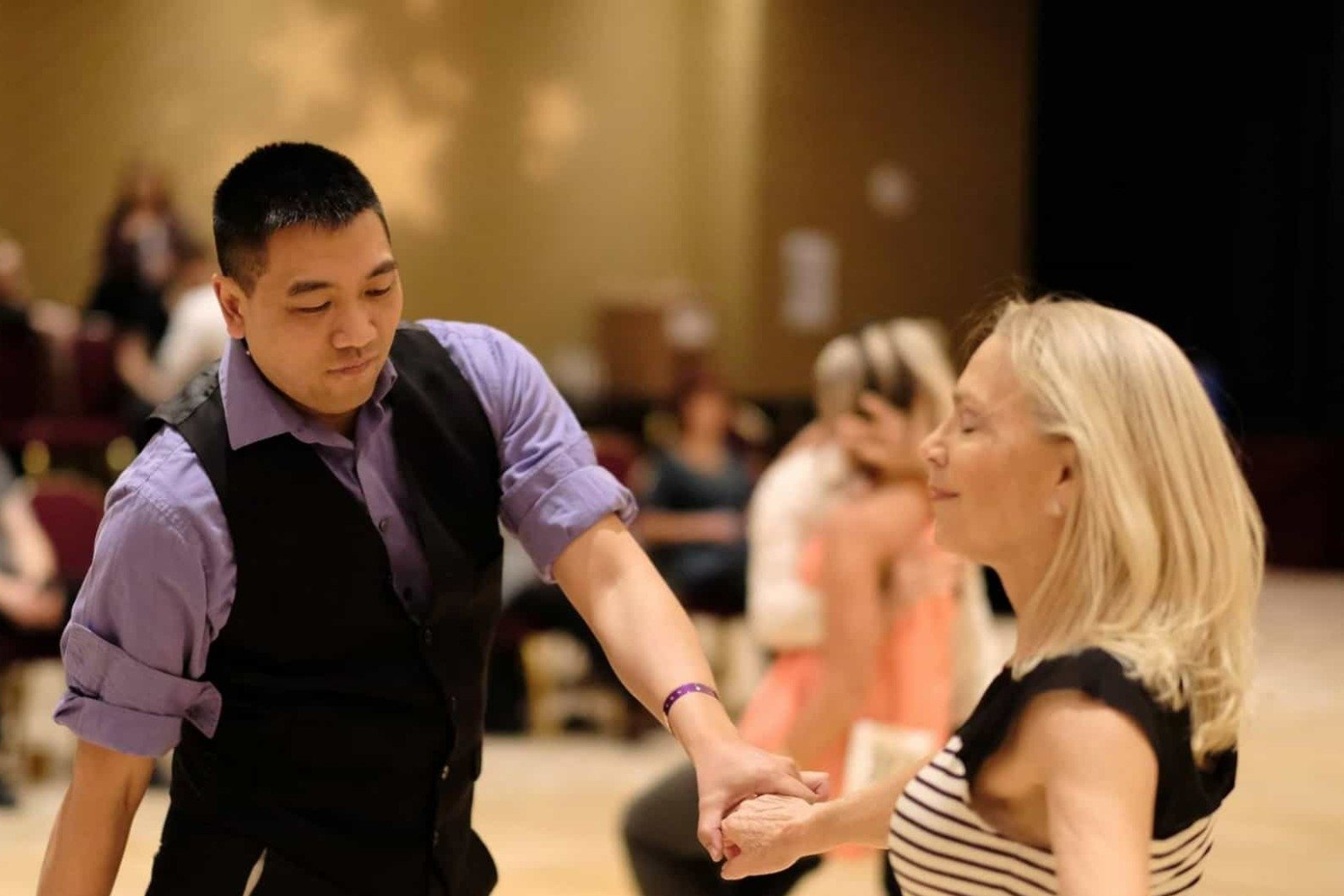 Kim dancing with partner in Jack & Jill swing competition