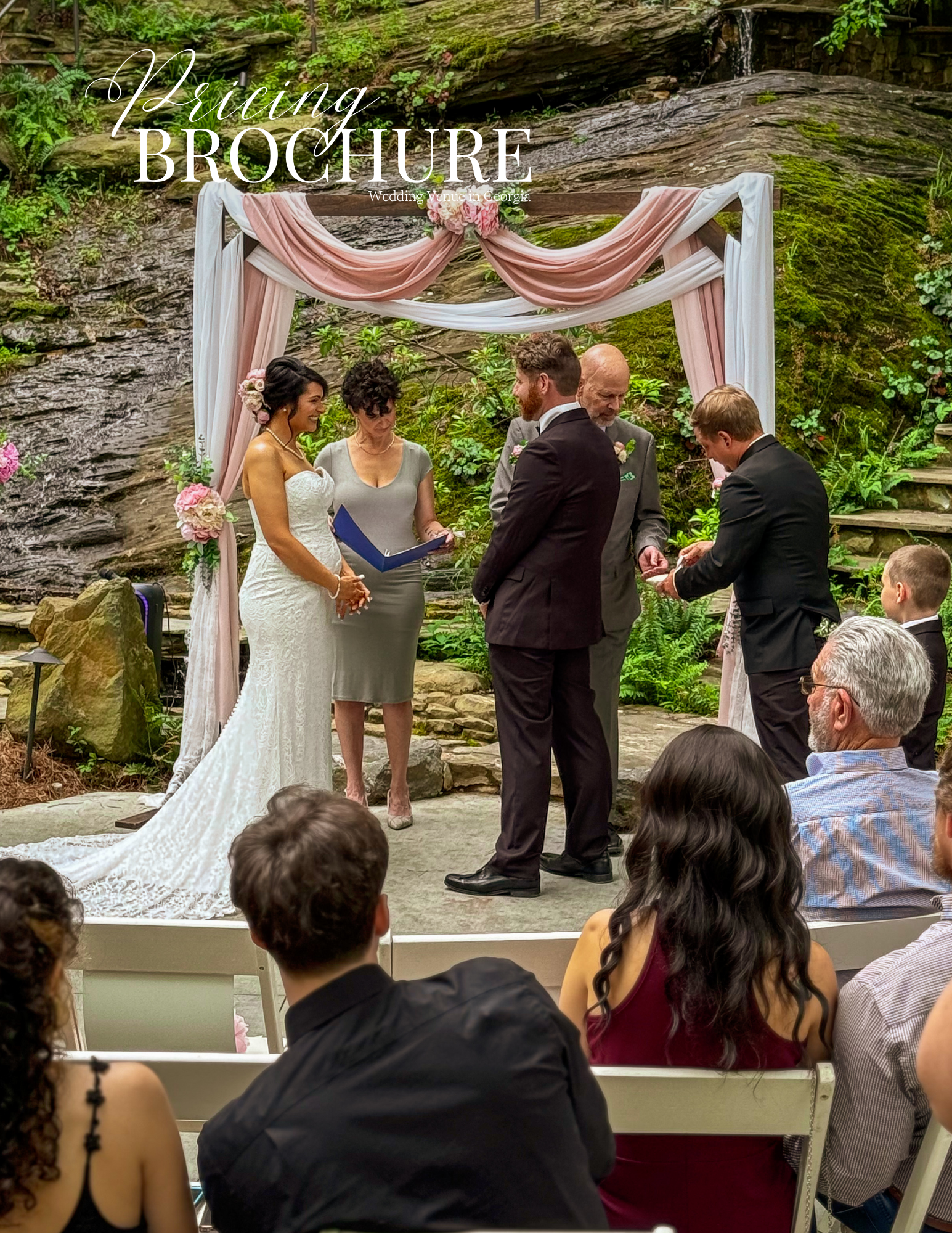 Wedding ceremony in an outdoor setting. Bride, groom, officiant, and guests gathered under draped arch.