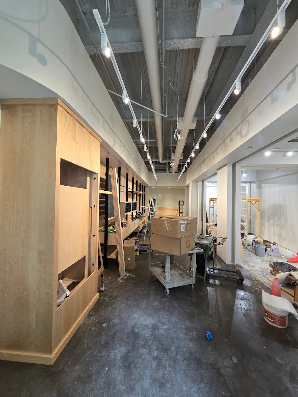 A large room with a lot of boxes on the floor