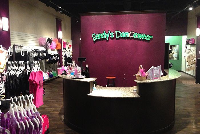 The inside of a store called sandy 's dancewear