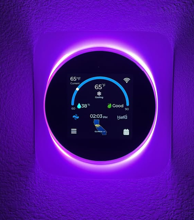 A thermostat that has 65 degrees on it