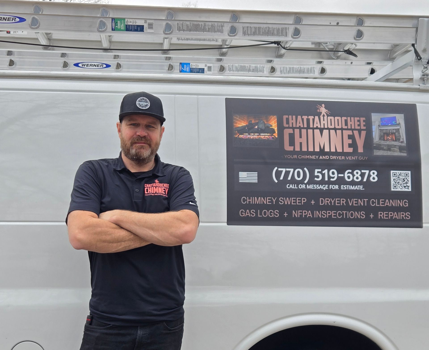 Man in black shirt and cap standing by a white service van with Chattahoochee Chimney sign.