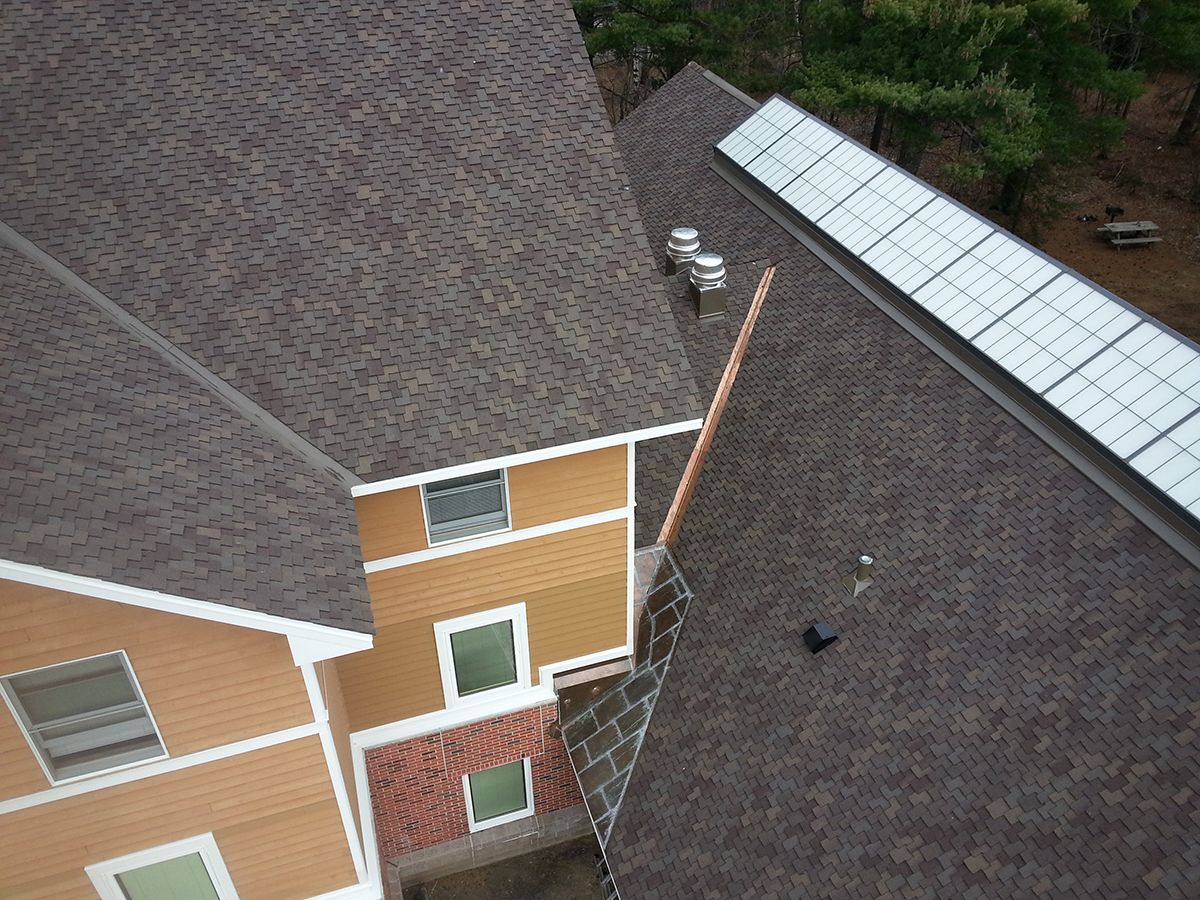 A fully-soldered copper saddle and Kal-Wal Skylight on the rooftop of Vermillion Community College.