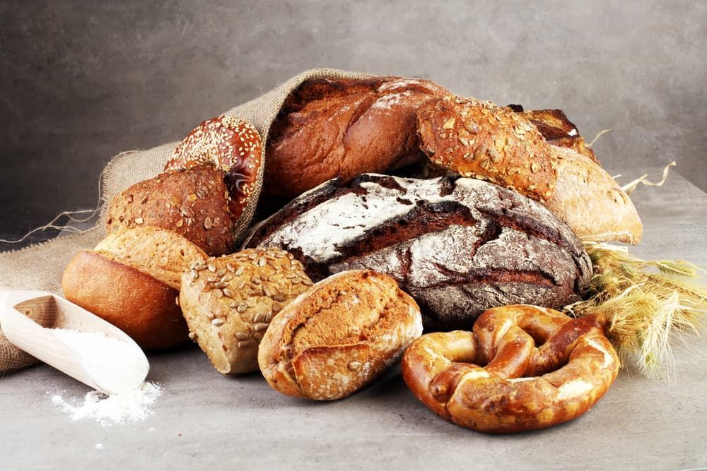 There Are Many Different Types of Bread on The Table — Brews & Bites Beachside Cafe in Meikleville Hill, QLD