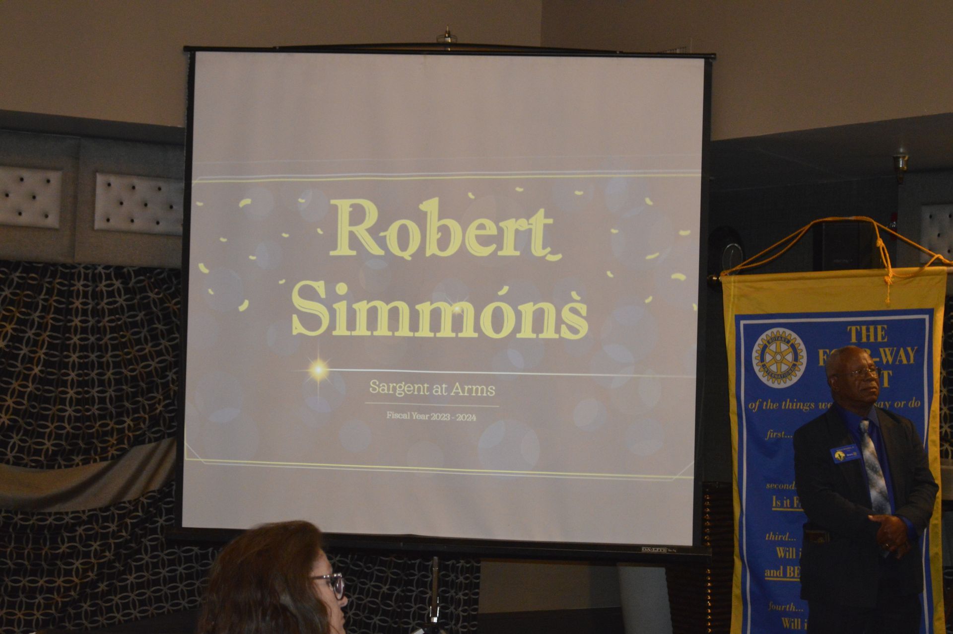 A man is giving a presentation about robert simmons