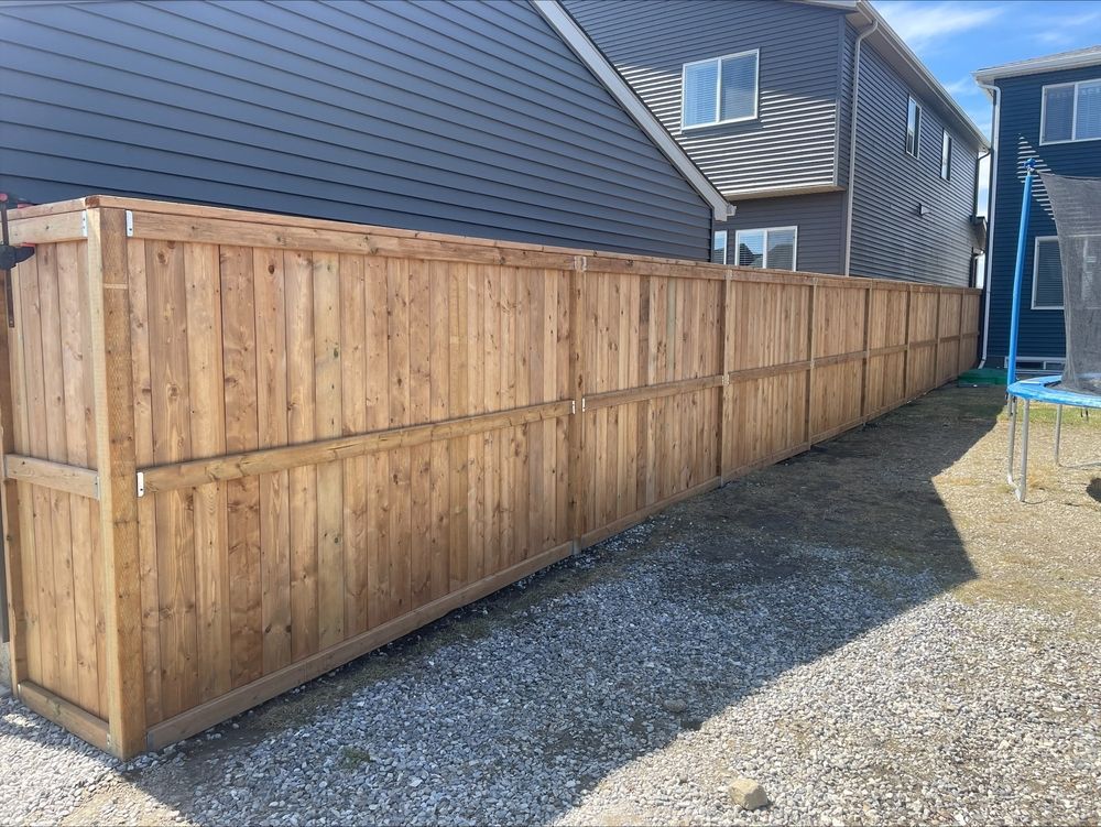 New wooden fence installation by our Toronto Fence Company