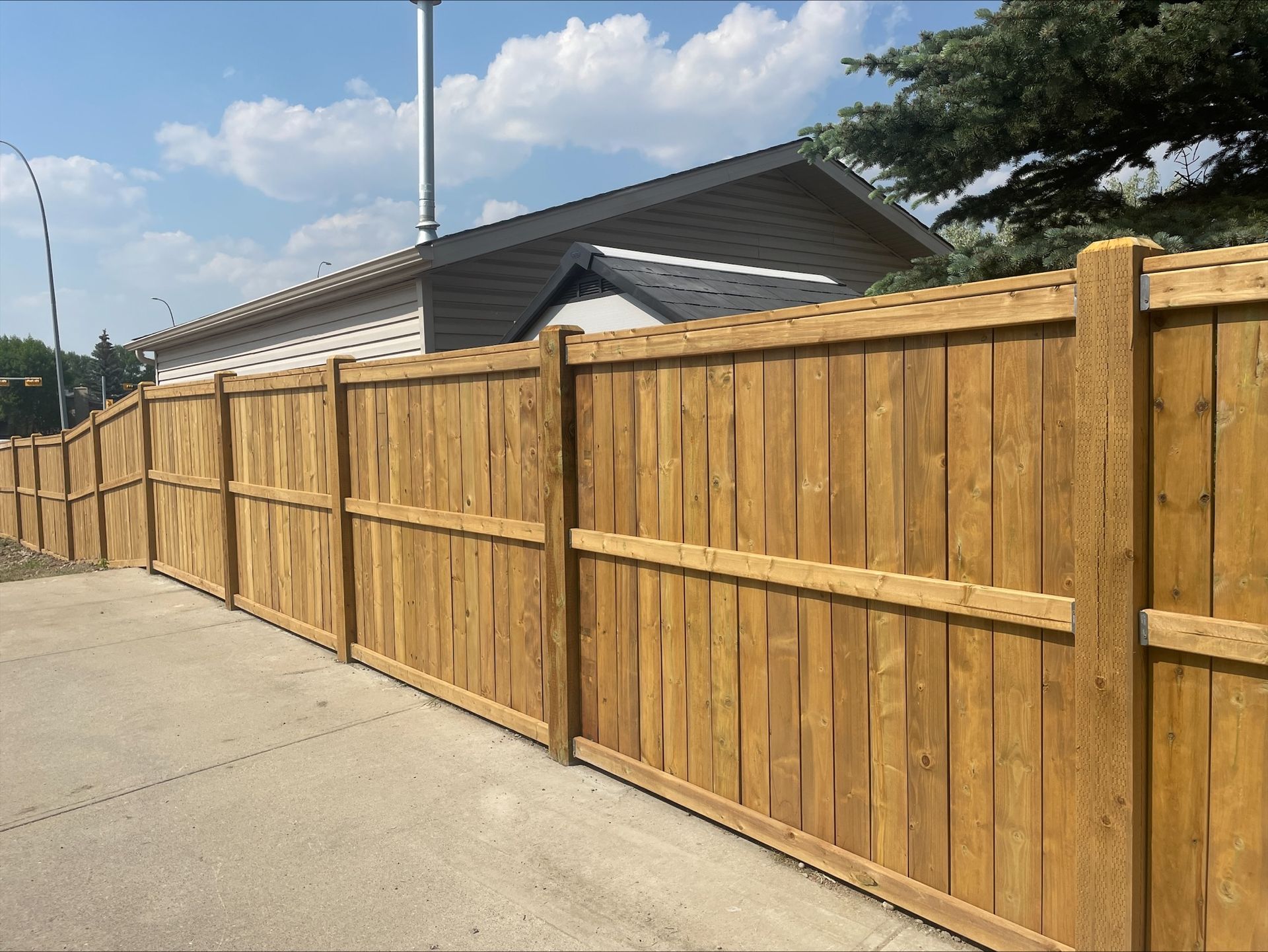Wooden fence installation from Toronto Fence Pros