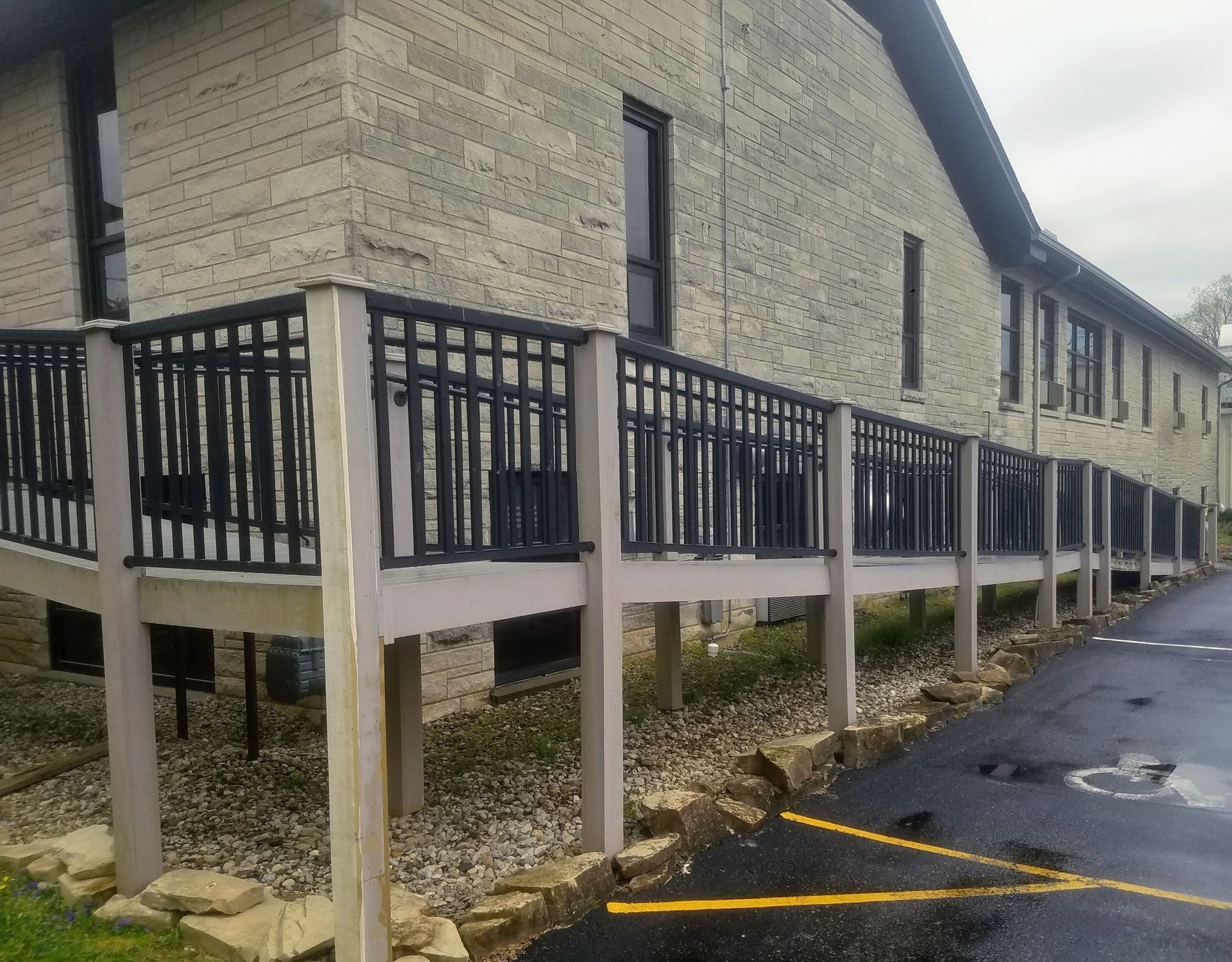 A building with a balcony on the side of it