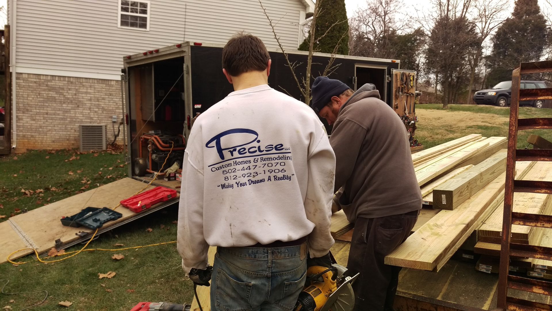 A man wearing a shirt that says ' tropical ' on it