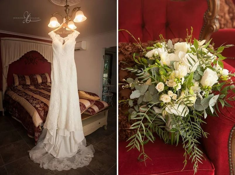 Wedding Dress Hanging From Chandelier, Bouquet on Red Velvet Chair — Villa Lamor in Balberra, QLD