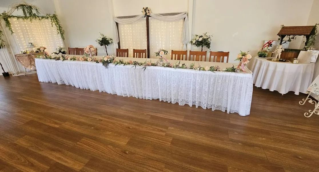 Long Rectangular Banquet Table Decorated for an Event, Set in a Light-filled Room — Villa Lamor in Balberra, QLD