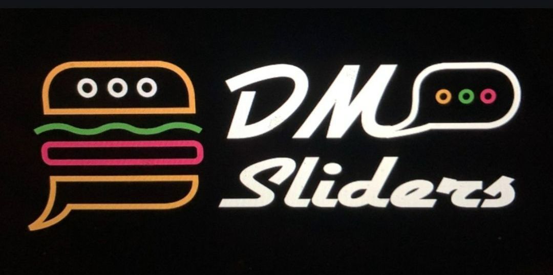 A neon sign for dmd sliders with a hamburger on it.  | Kensington, MD | Kensington Car Show