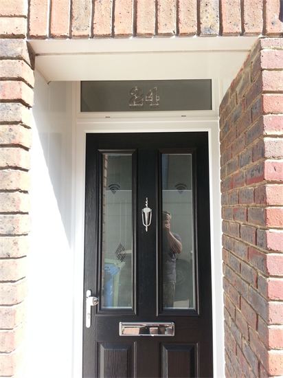 composite door with glass panels