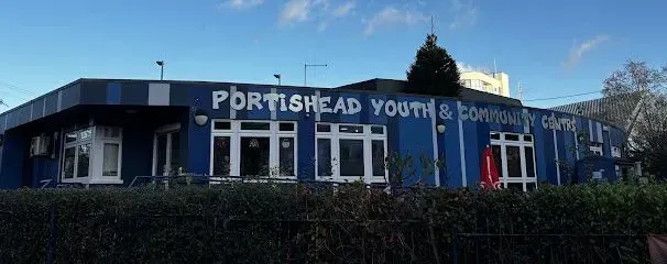 Portishead Youth & Community Centre, blue building with white signage, sky in the background.