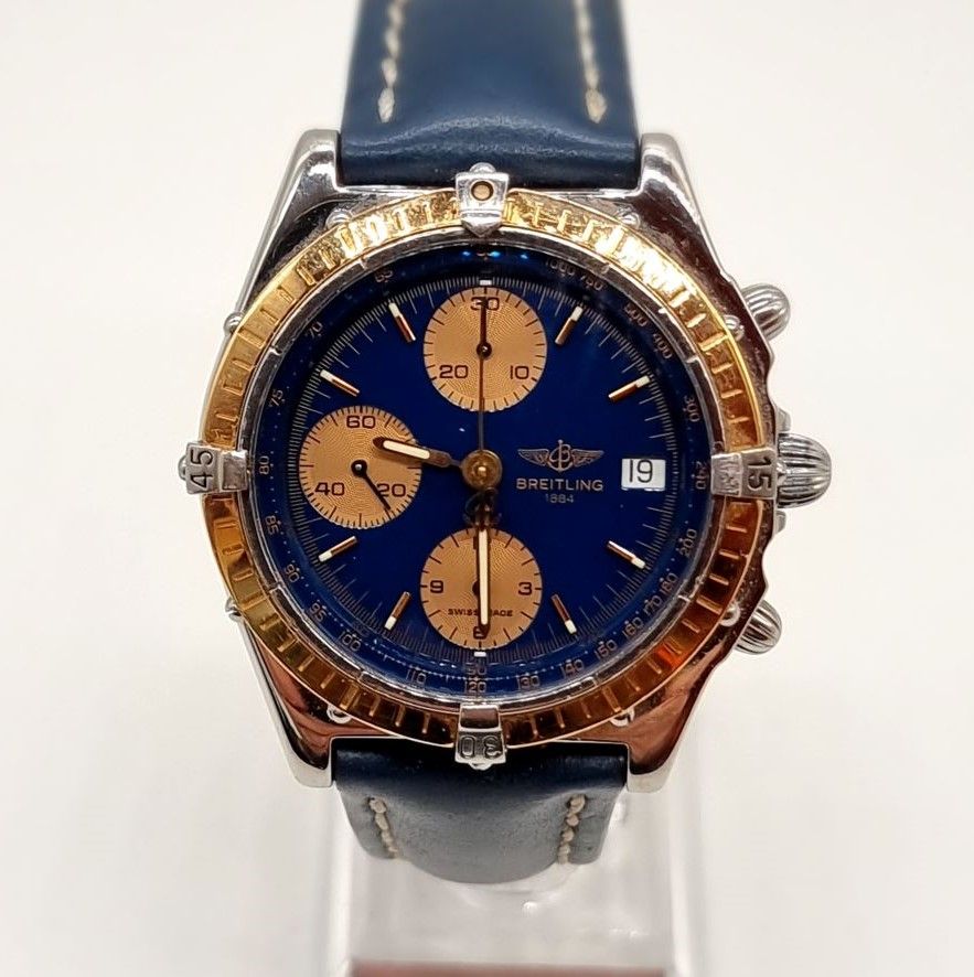 Orologio usato ricondizionato BREITLING CHRONOMAT in acciaio e oro con cinturino in pelle.