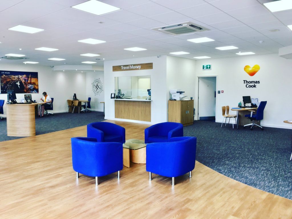 4 blue arm chairs