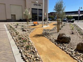 A walkway in front of a building that says child 's