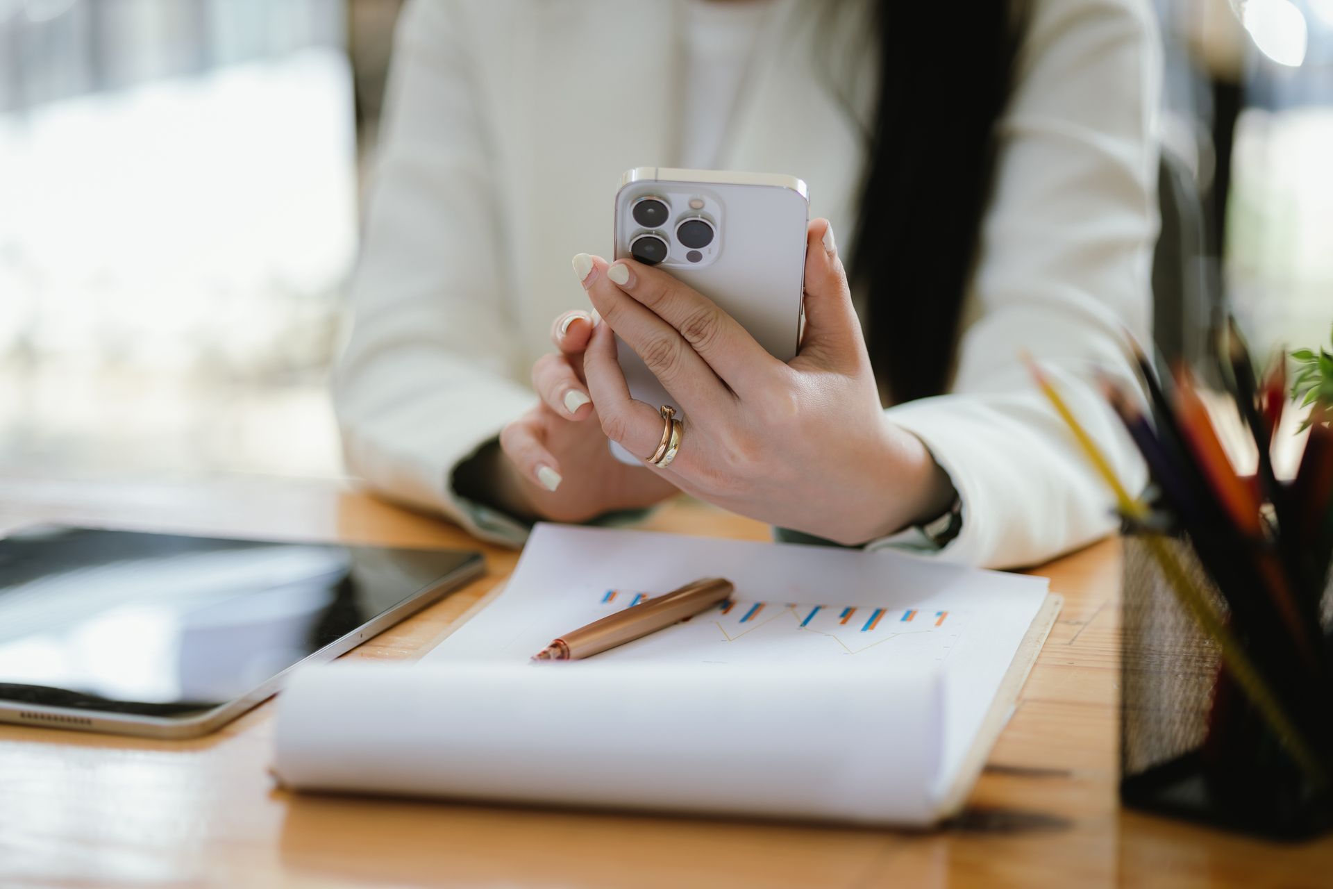 woman with phone in hand