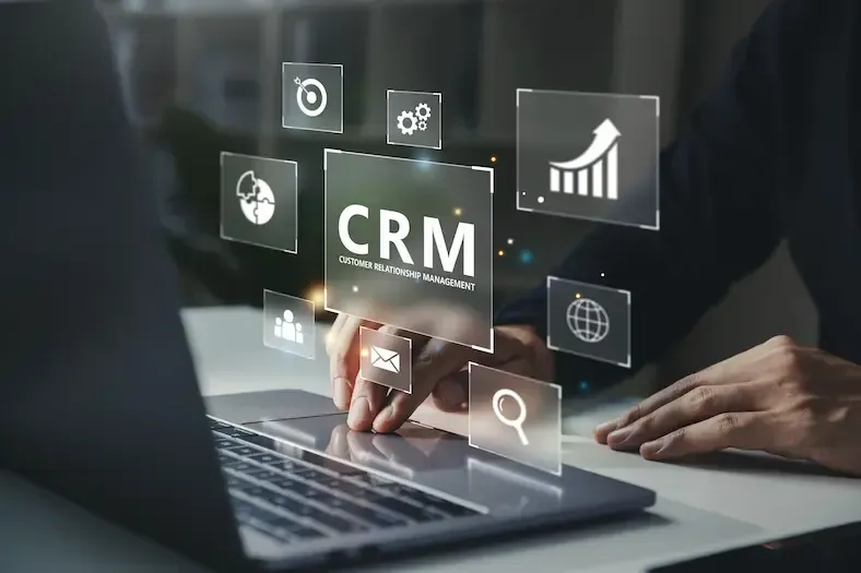 Laptop computer with CRM above it