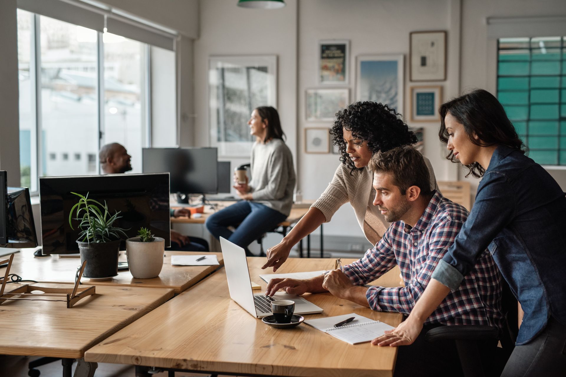 Small business team working on computer