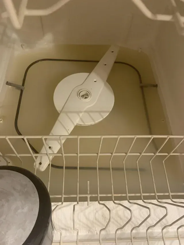 broken dishwasher full of water